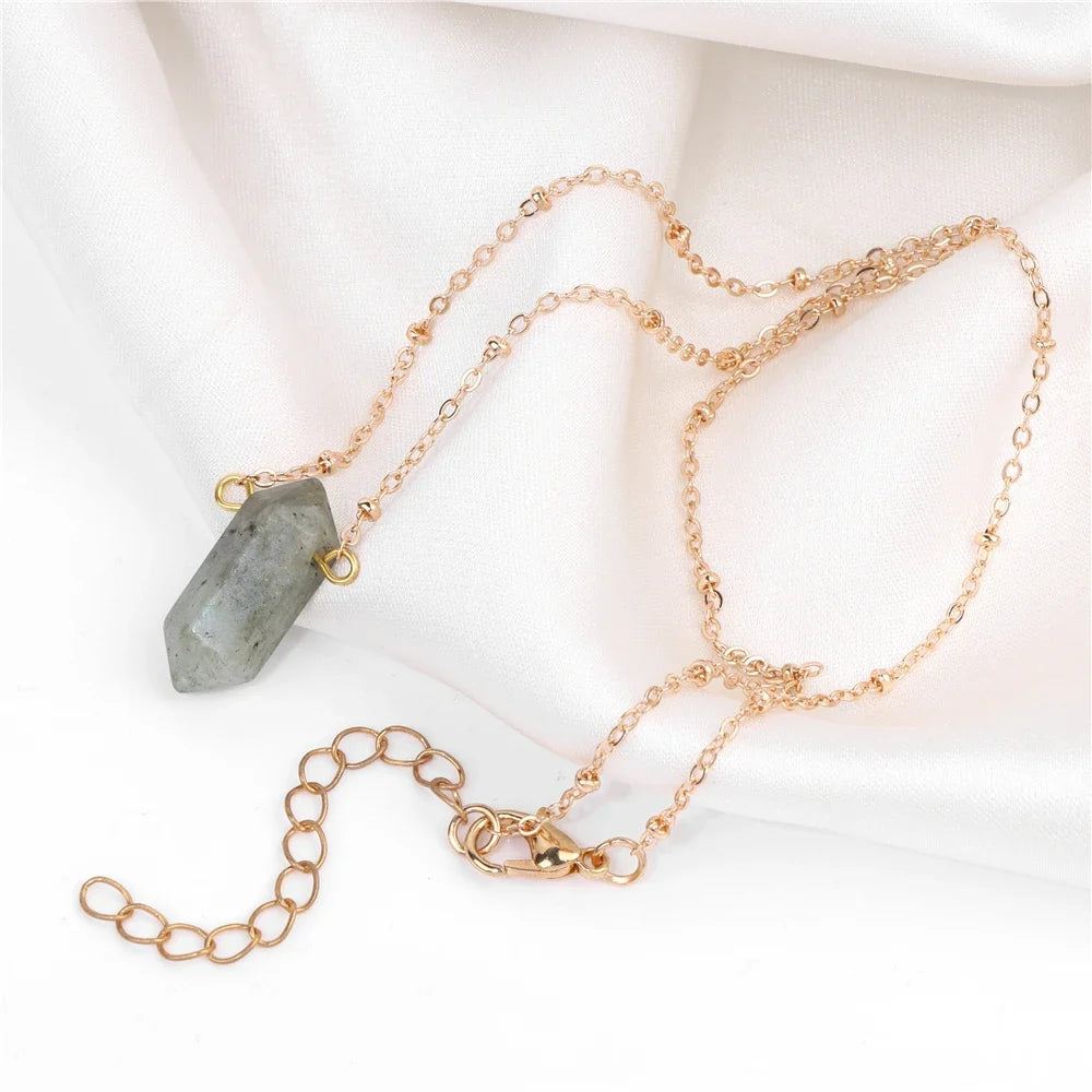 Hexagonal crystal column pendant in gold-plated setting on a fine chain — view 3 of 12