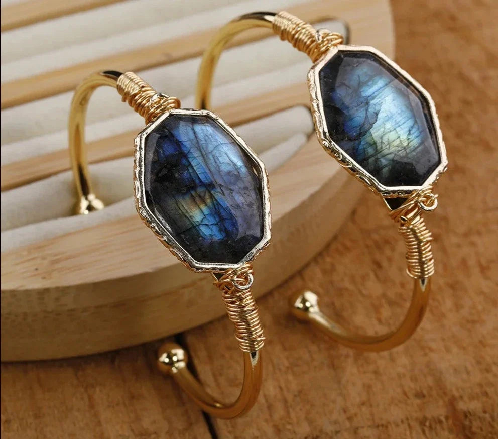 Open bangle cuff bracelet set with a large octagonal labradorite stone showing blue and green flash — product photo 6