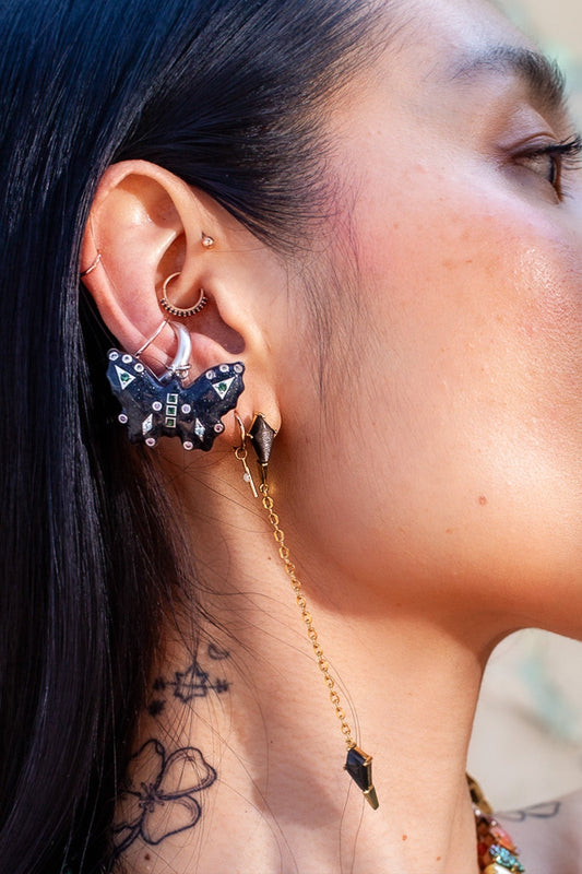 Butterfly enamel ear cuff in oxidized silver, side view