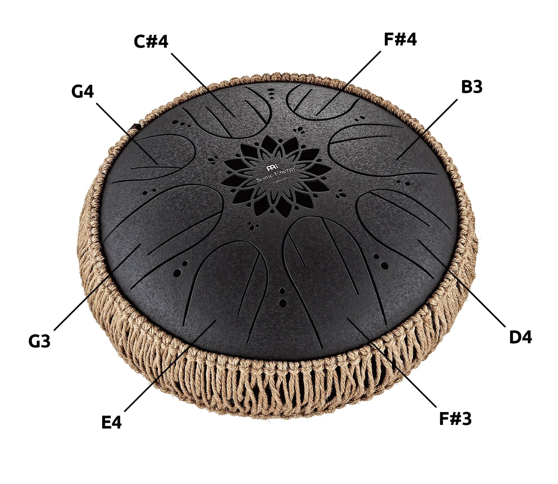 Black 10-inch steel tongue drum presented in a calm, naturally lit setting.