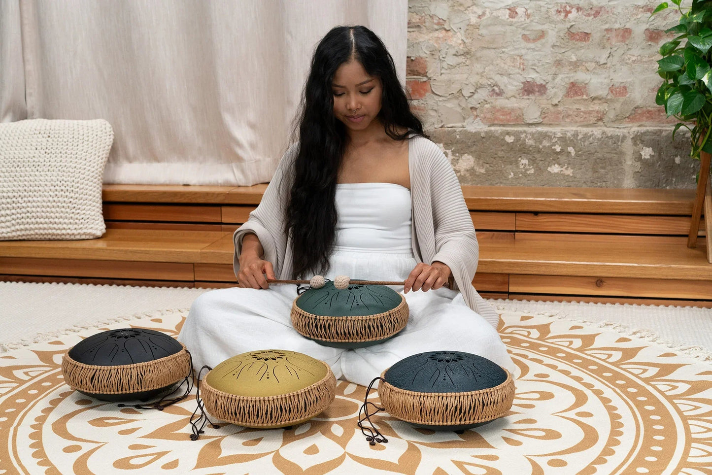 10-inch gold steel tongue drum in C major with eight notes and wooden mallets — view 8 of 11
