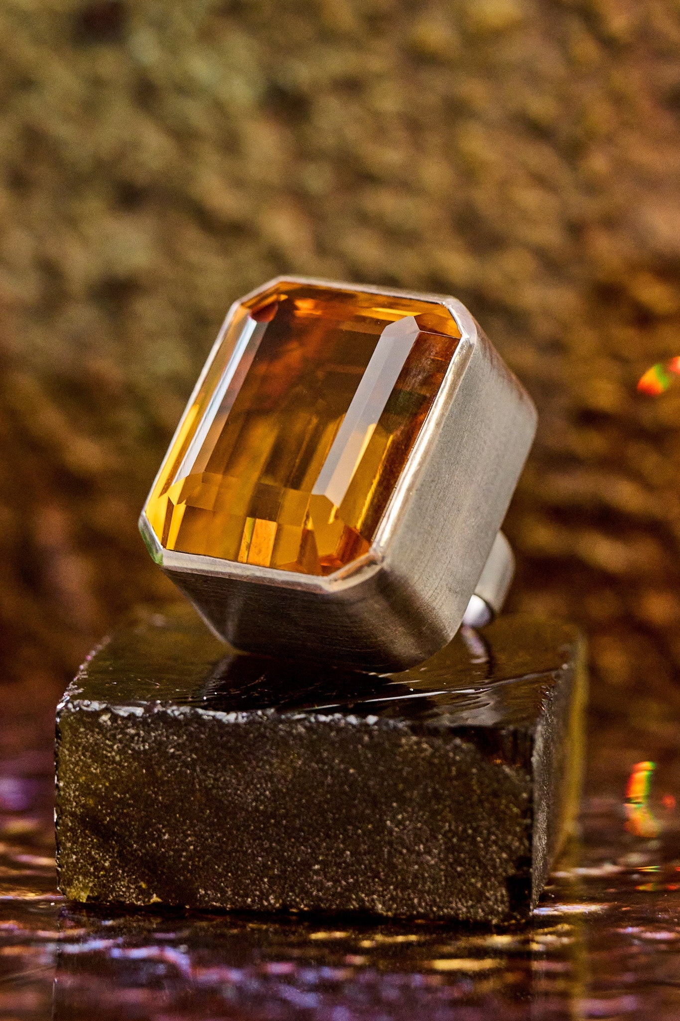 Detail of the amber glow in the golden yellow glass