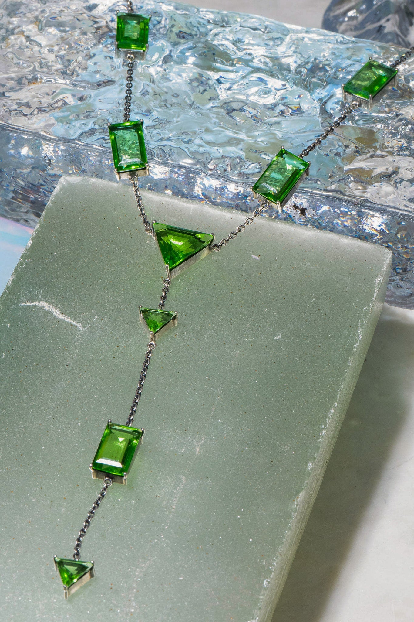 Slink Y-Chain in Green Envy — thin oxidized silver cable chain strung with luminous green glass in a Y-drop silhouette — view 5