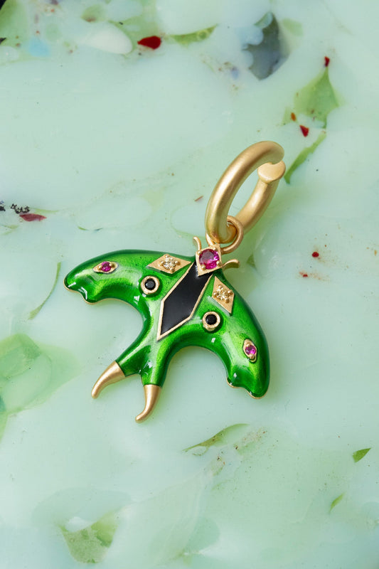 Luna Moth Enamel Ear Cuff in gold — iridescent enamel moth charm set with glass crystals and genuine onyx, worn on the upper ear