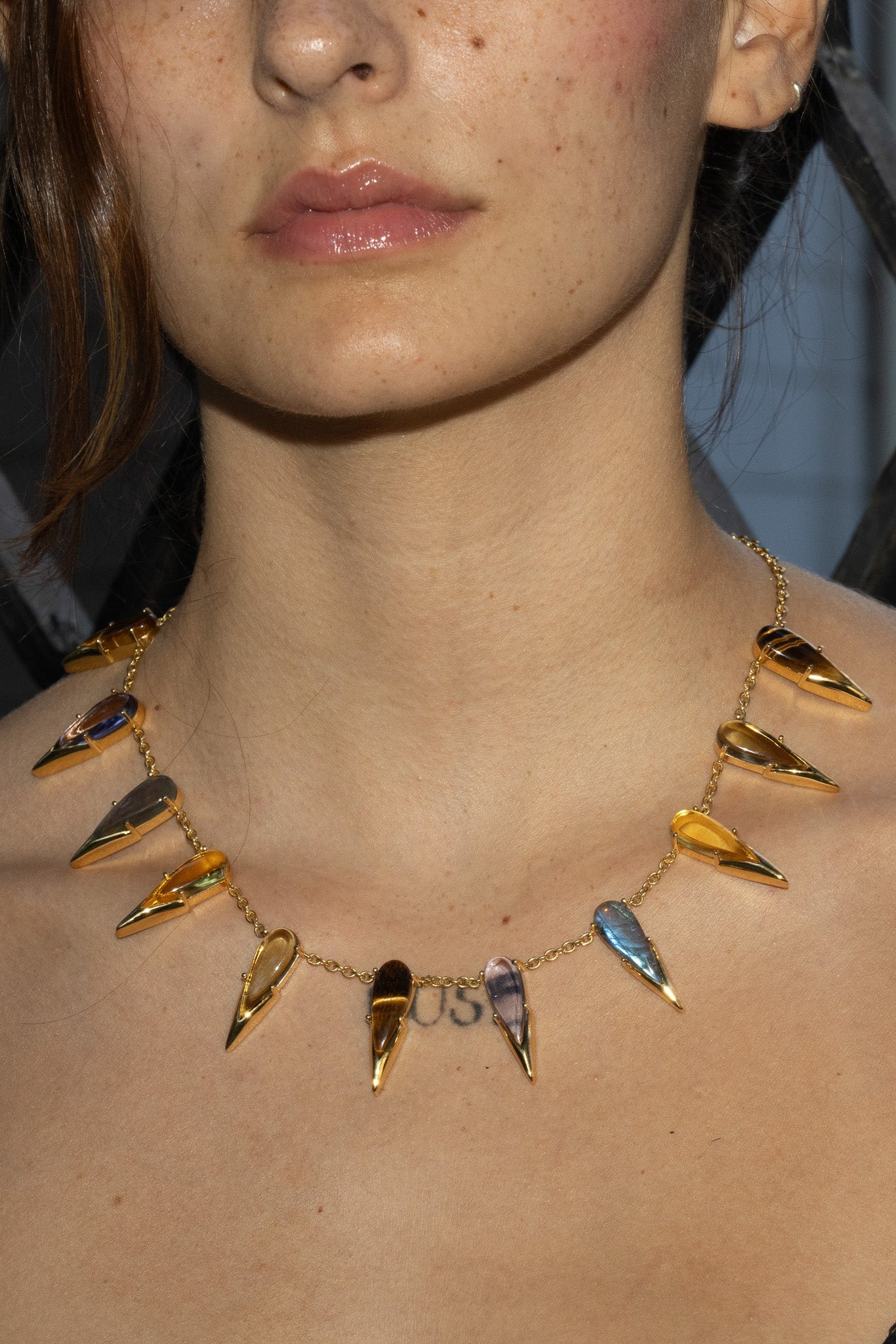 Saber Tooth Necklace in Angora (gold) — domed tiger eye, smoky quartz and labradorite stones capped with sharp gold tips on thin silver cable chain — view 2