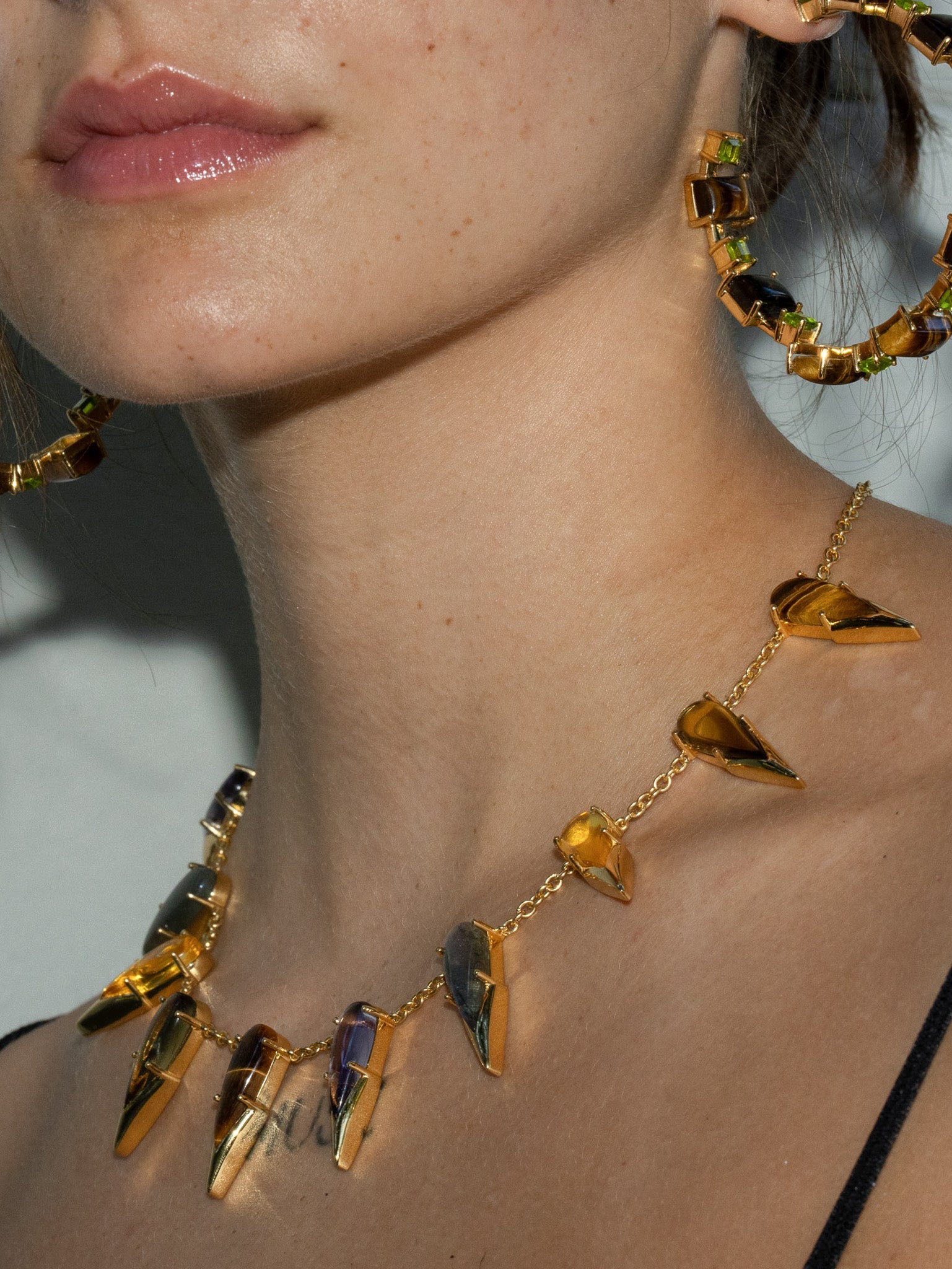 Saber Tooth Necklace in Angora (gold) — domed tiger eye, smoky quartz and labradorite stones capped with sharp gold tips on thin silver cable chain — view 3