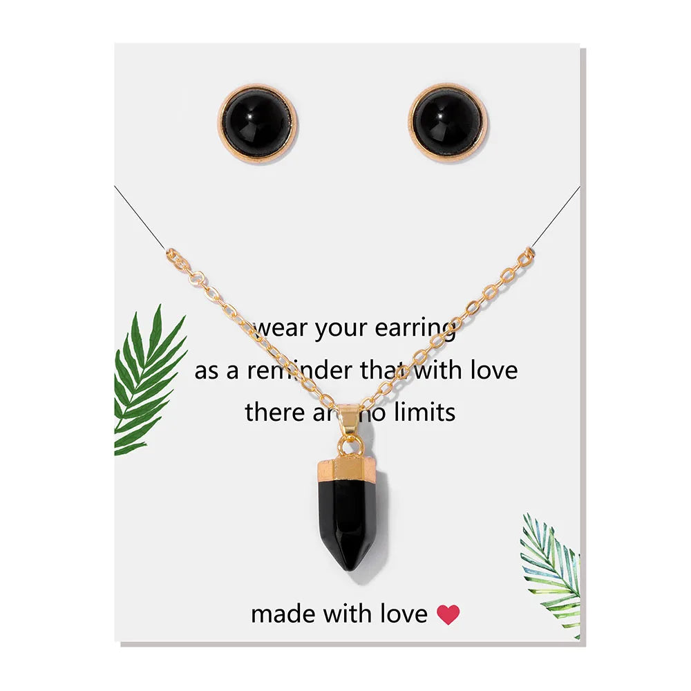 Crystal point pendant necklace with a hexagon gemstone column on a gold-tone link chain — view 8 of 20