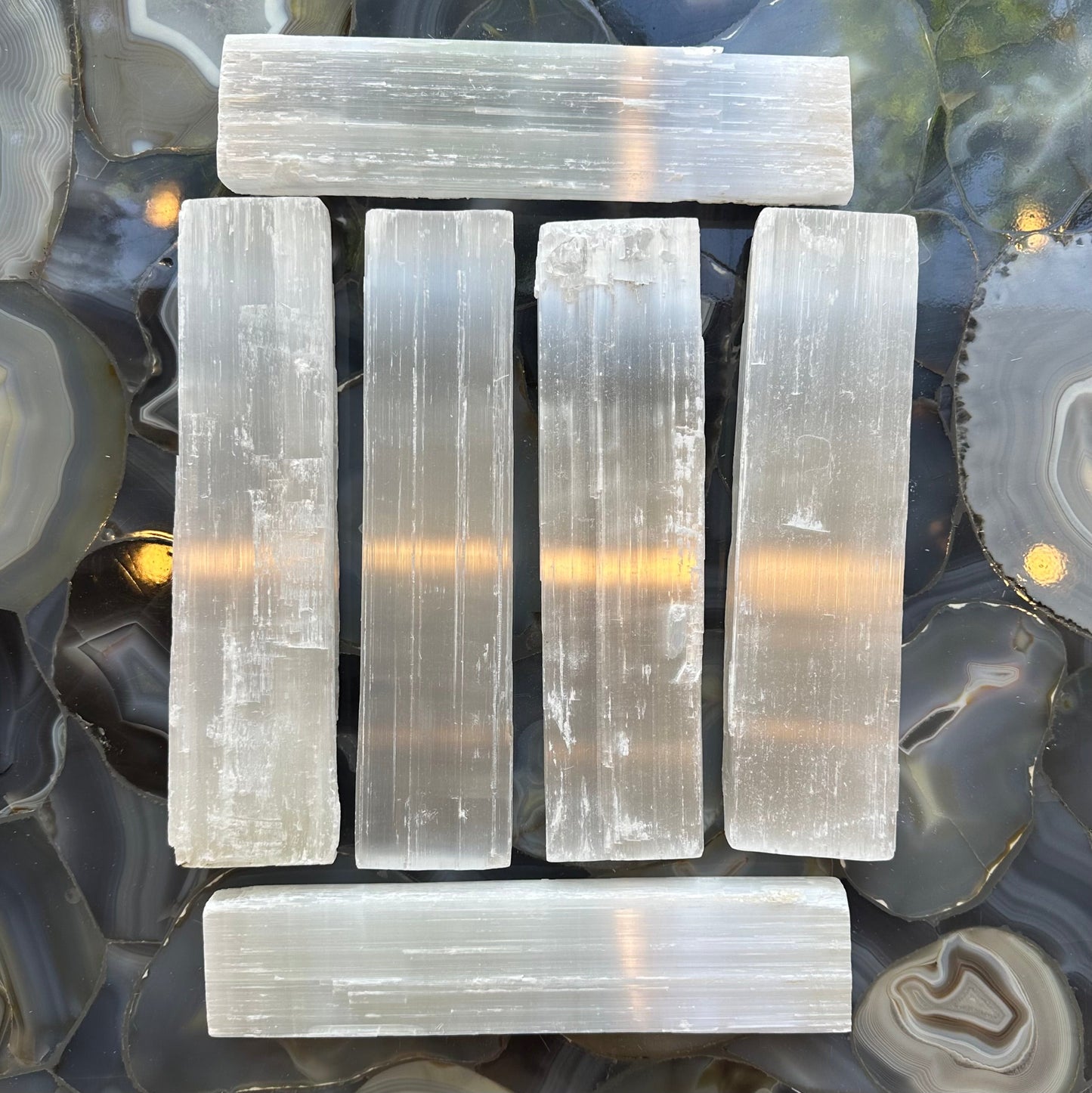 Large rough selenite bar showing its fibrous white surface