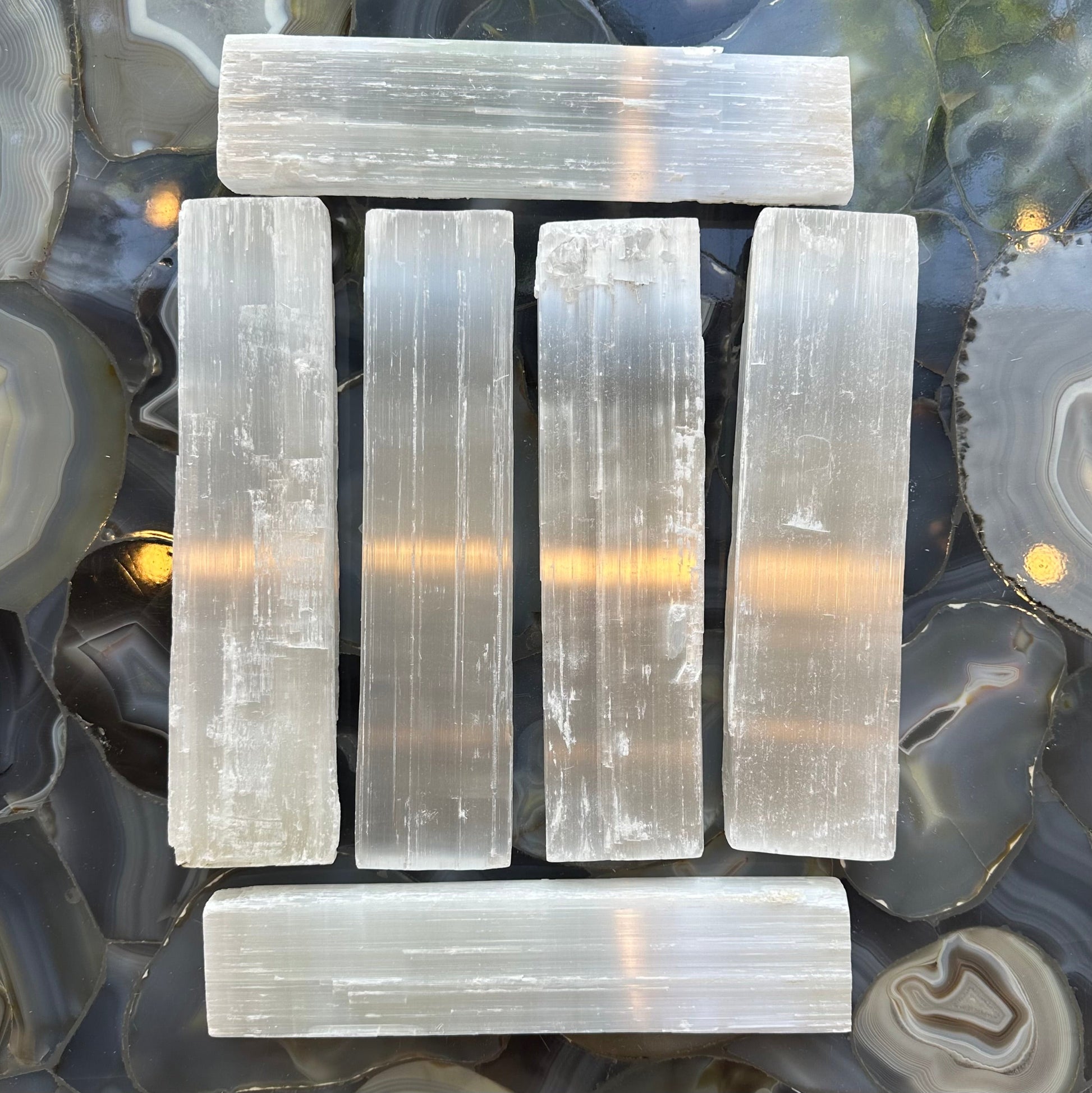 Large rough selenite bar showing its fibrous white surface
