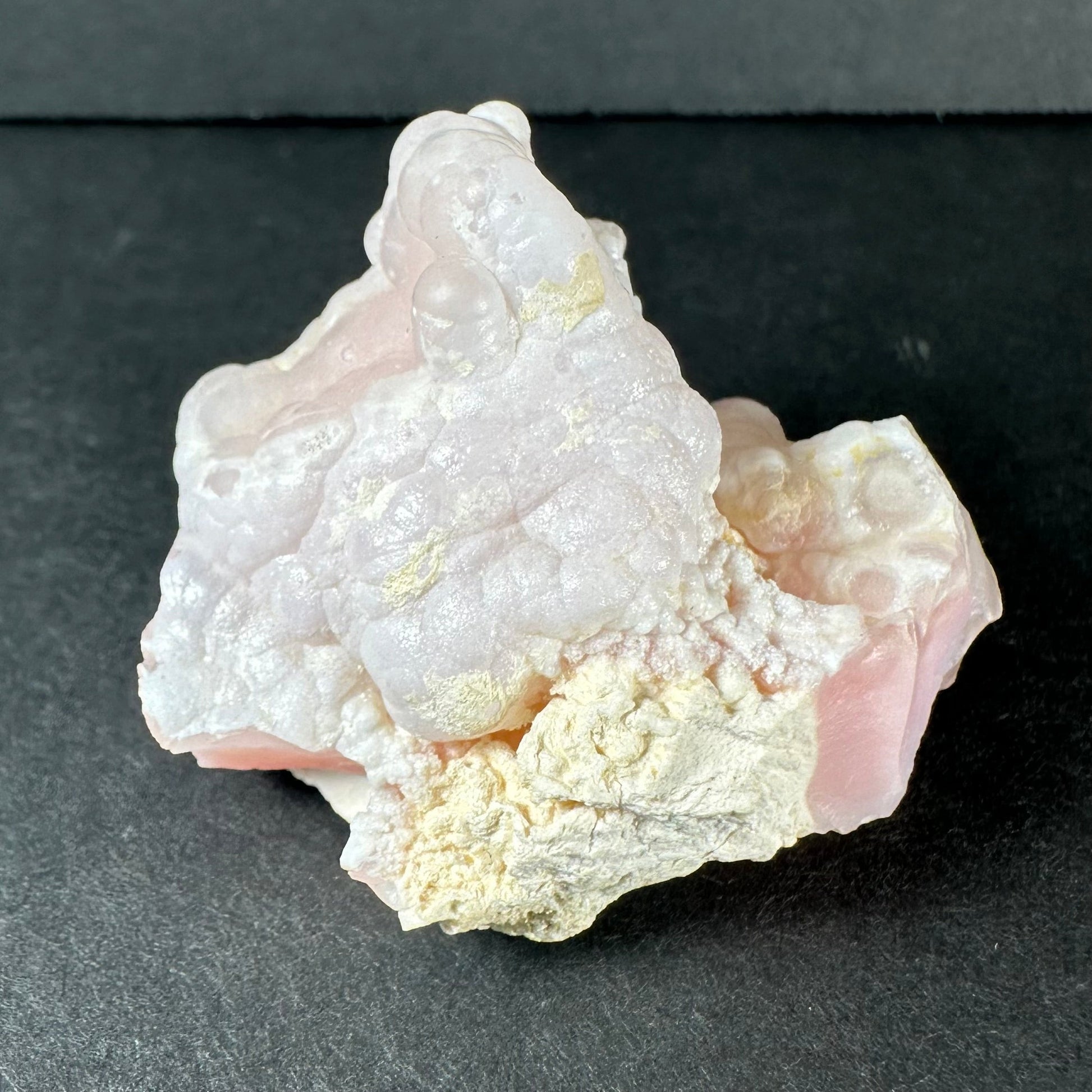 Botryoidal pink opal specimen from Ica, Peru, with rounded bubble-like formations in soft matte pink — view 3