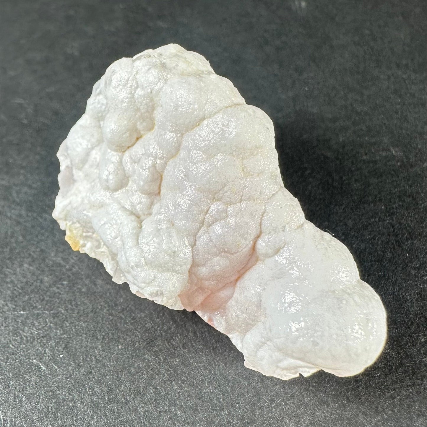 Botryoidal pink opal specimen from Ica, Peru, with rounded bubble-like formations in soft matte pink — view 5