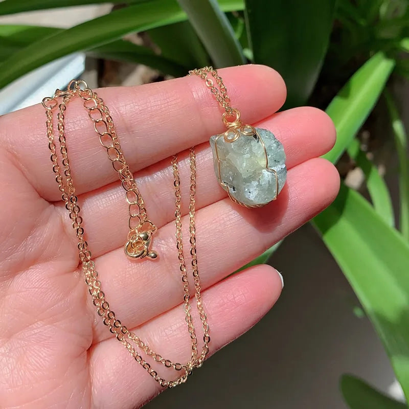 Raw wire-wrapped crystal pendant on a gold-plated stainless steel link chain — view 15 of 20