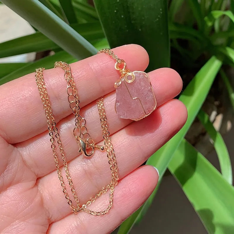Raw wire-wrapped crystal pendant on a gold-plated stainless steel link chain — view 10 of 20