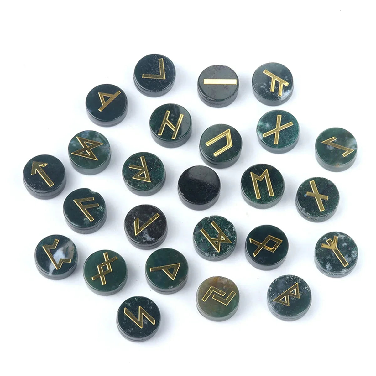 Set of round polished crystal runes engraved with runic symbols, scattered on a dark surface — view 4 of 12