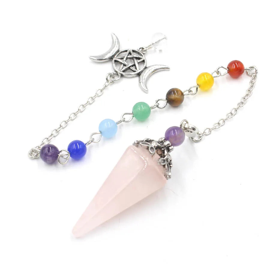 Hexagonal crystal point pendulum with a triple moon pentacle chakra cap, hanging from a fine silver-tone chain — product photo 6