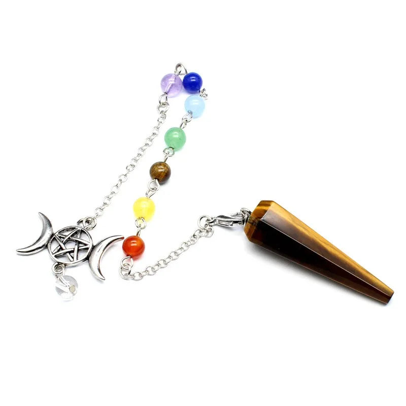 Hexagonal crystal point pendulum with a triple moon pentacle chakra cap, hanging from a fine silver-tone chain — product photo 4