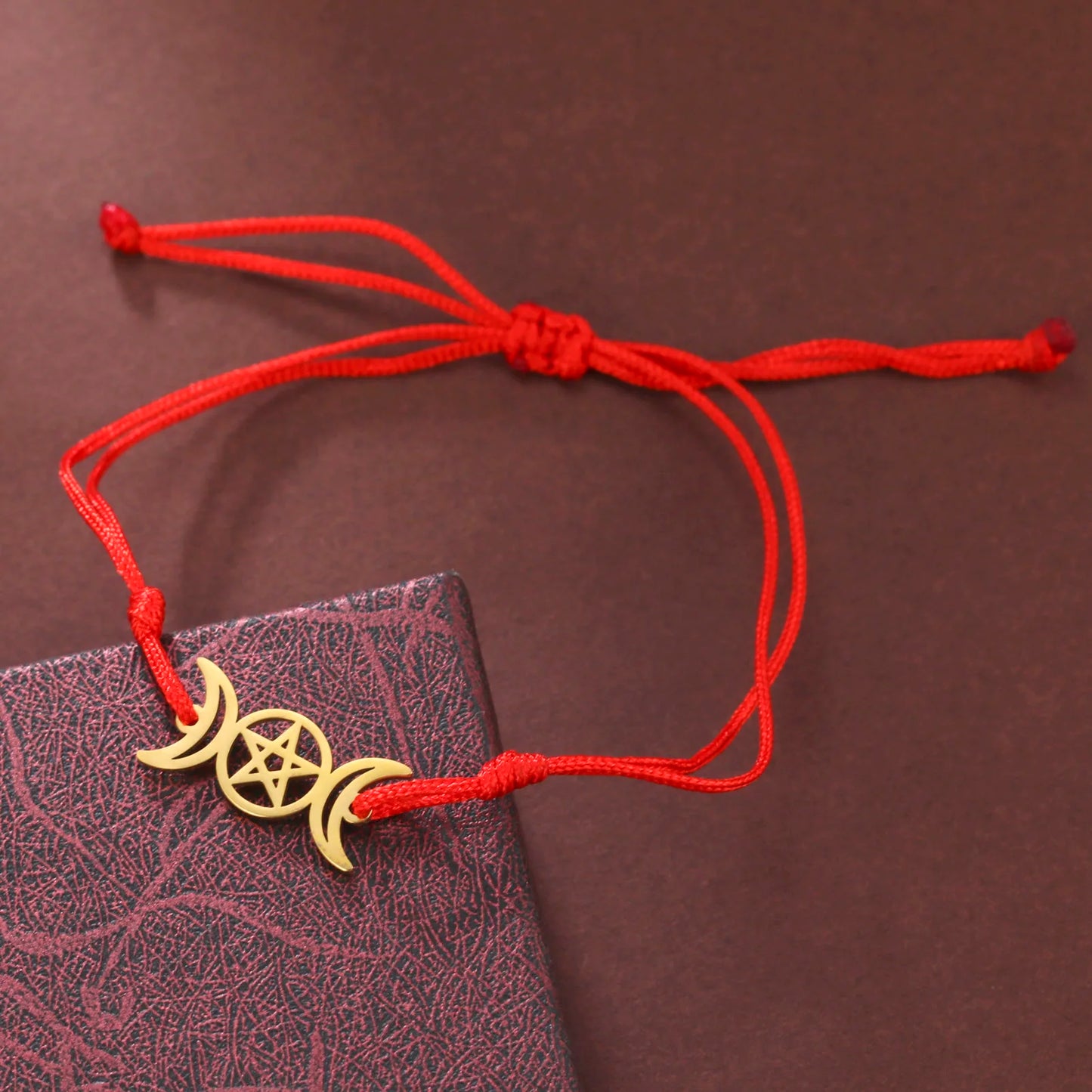 Triple moon pentacle charm in stainless steel on an adjustable lace-up cord bracelet — view 10 of 13
