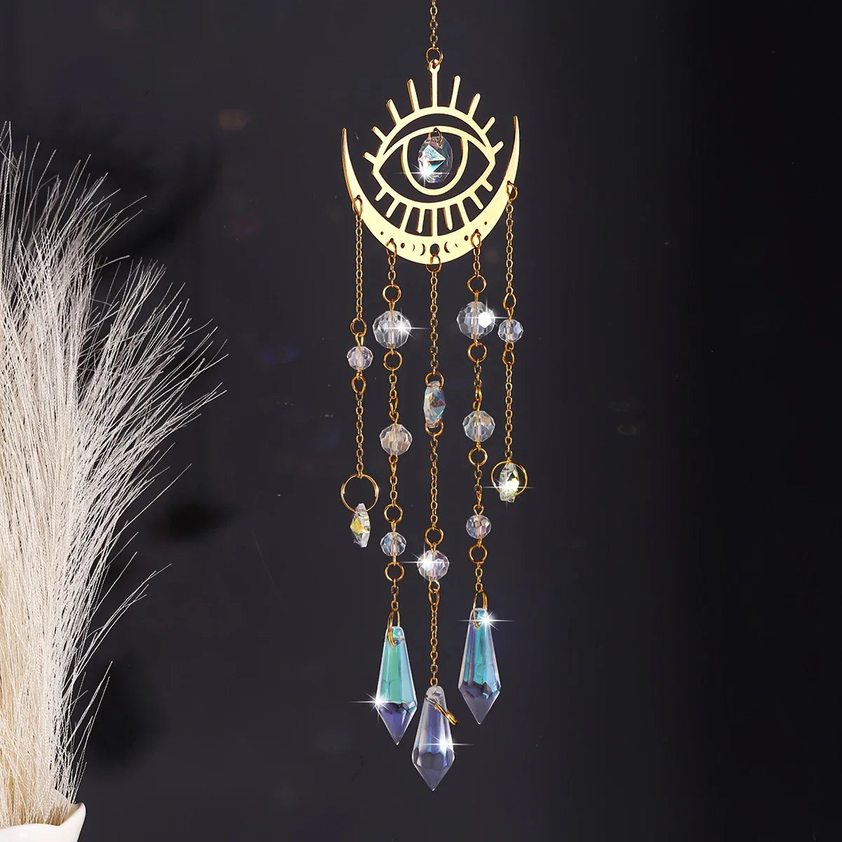 Gold moon phase and sun crystal suncatcher hanging in a window, with faceted K9 crystal prisms — product photo 2
