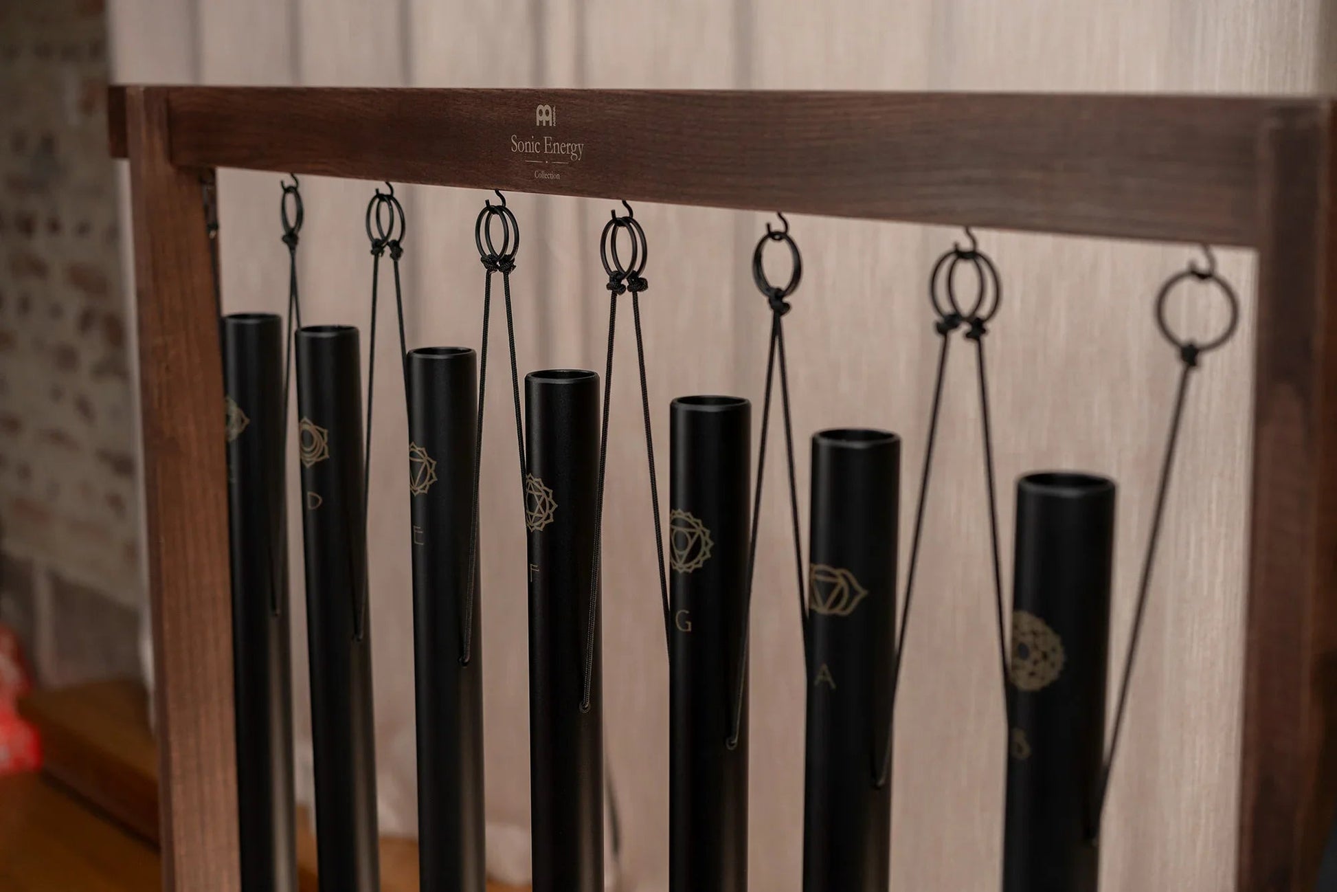 Seven-piece sound bath tube chime chakra set in black with removable wooden holders — view 6 of 7