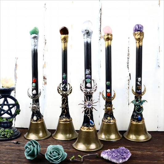 Large altar bell hung with natural crystal charms against a dark background — view 1 of 9