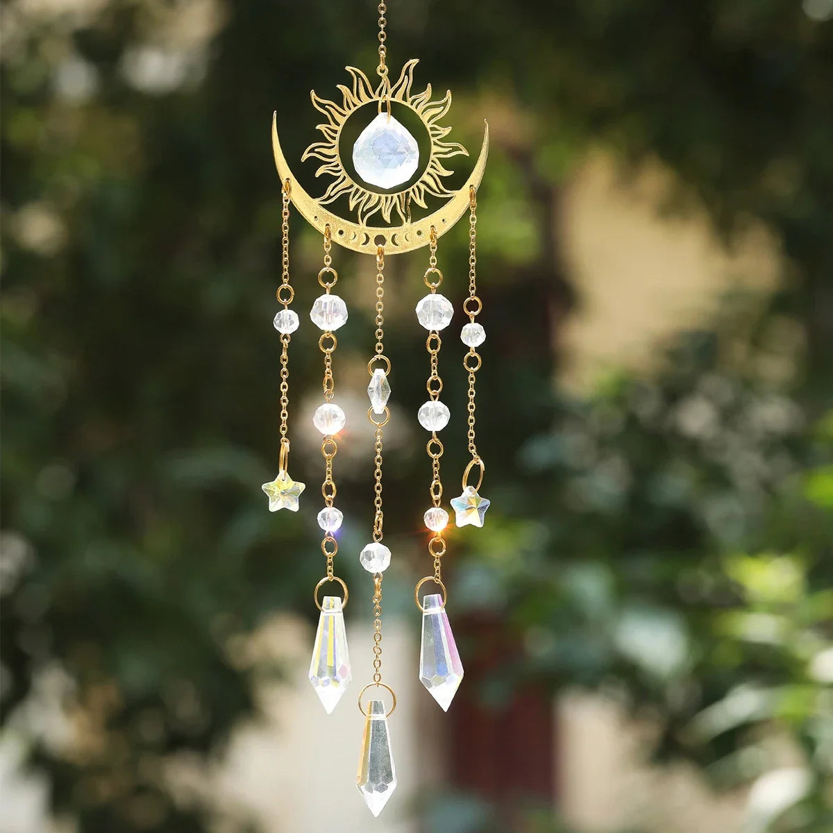 Gold moon phase and sun crystal suncatcher hanging in a window, with faceted K9 crystal prisms — product photo 5