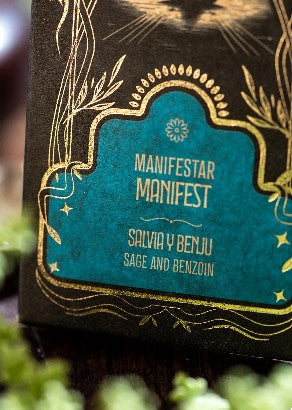 Manifestar Manifest label detail — sage and benzoin — printed in gold on black