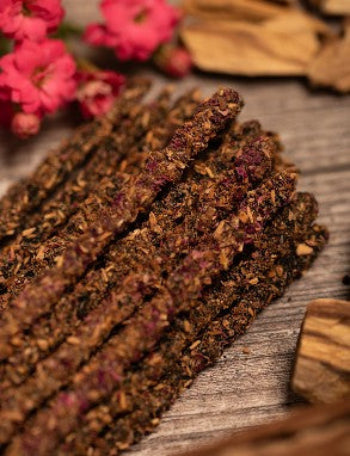 A box of thirty thick Rose Palo Santo incense sticks, shown from a different angle.