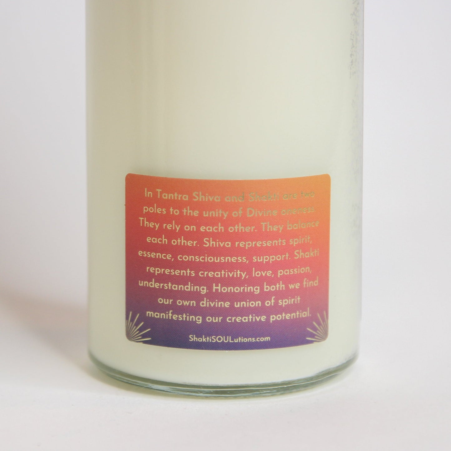 Back of the Shiva Shakti altar candle showing the printed image and inscription