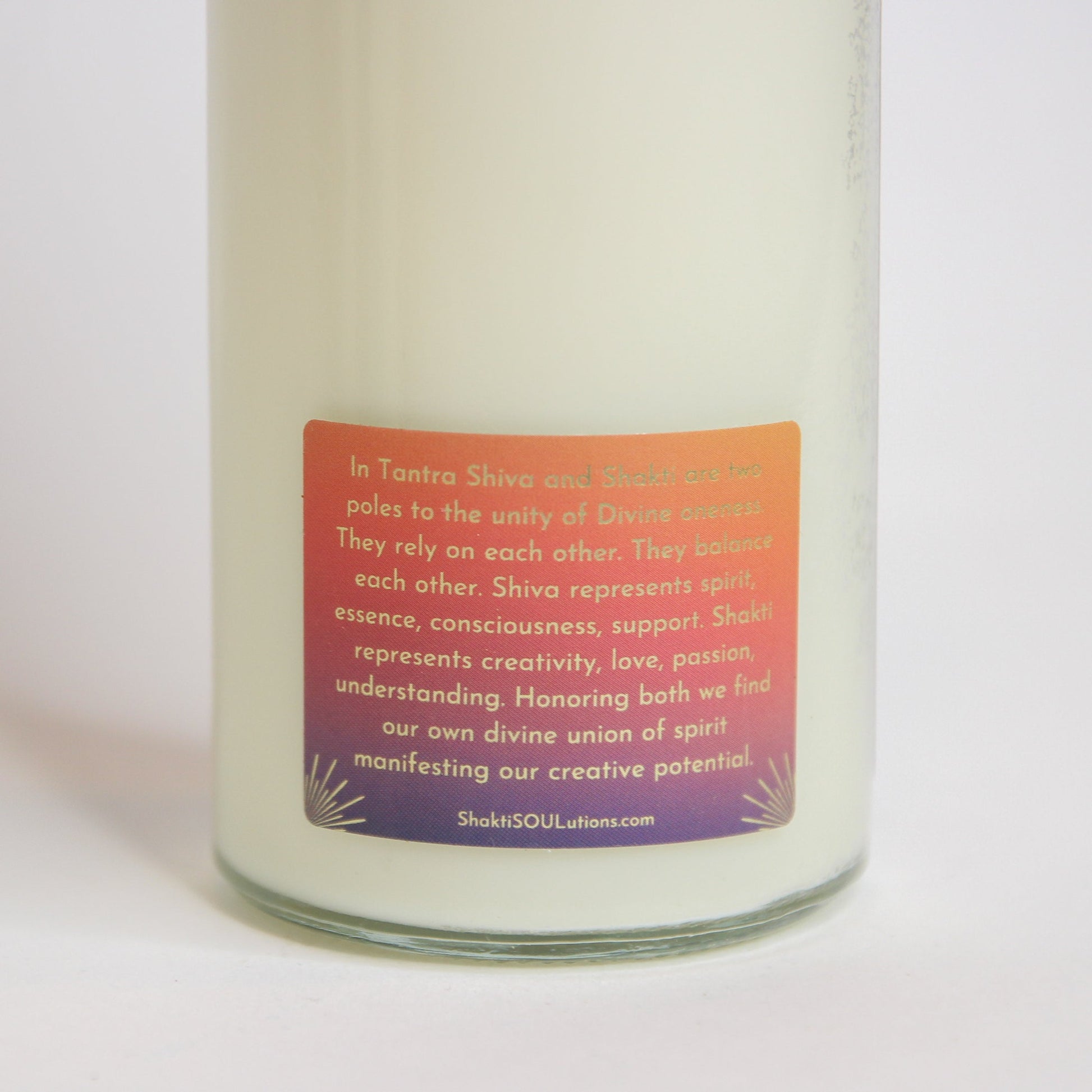 Back of the Shiva Shakti altar candle showing the printed image and inscription