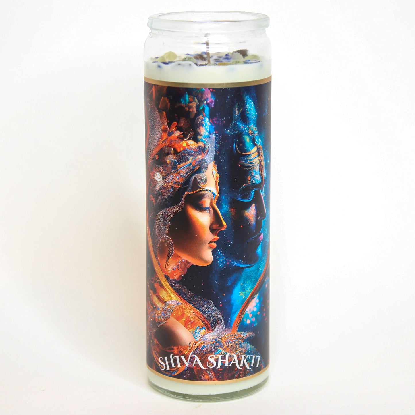 The Shiva Shakti altar candle styled on a dark altar surface