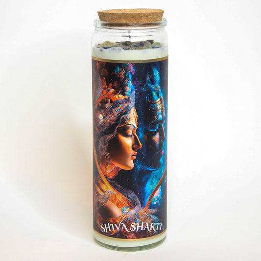 Shiva Shakti crystal altar candle in a clear glass vessel, topped with crystals