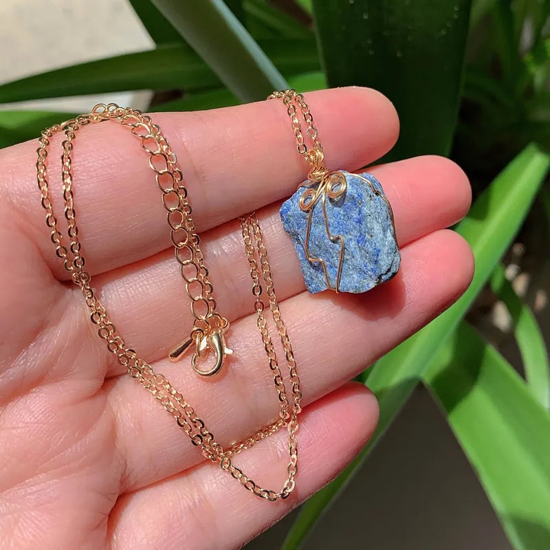 Raw wire-wrapped crystal pendant on a gold-plated stainless steel link chain — view 4 of 20