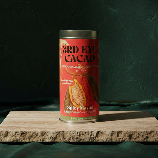 3rd Eye Cacao Spicy Mayan tin standing on a stone plinth against a deep green backdrop