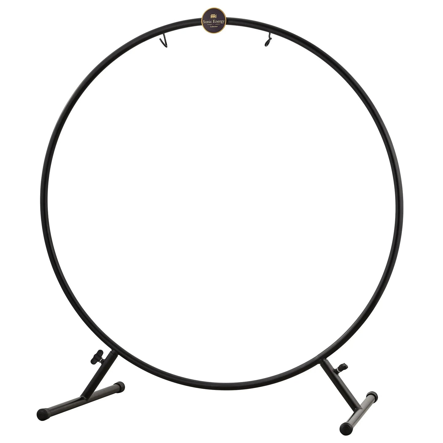 Black powder-coated round Meinl Sonic Energy gong stand shown in a warm, softly lit styled scene.