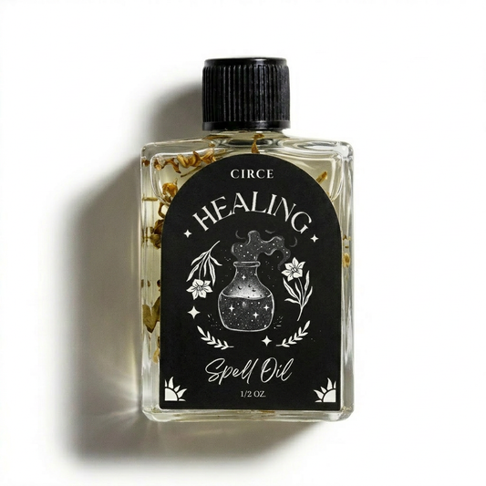 Healing ritual oil in a half ounce twist-top glass bottle with calendula