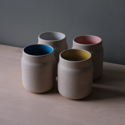 Handmade stoneware coffee tumbler mug