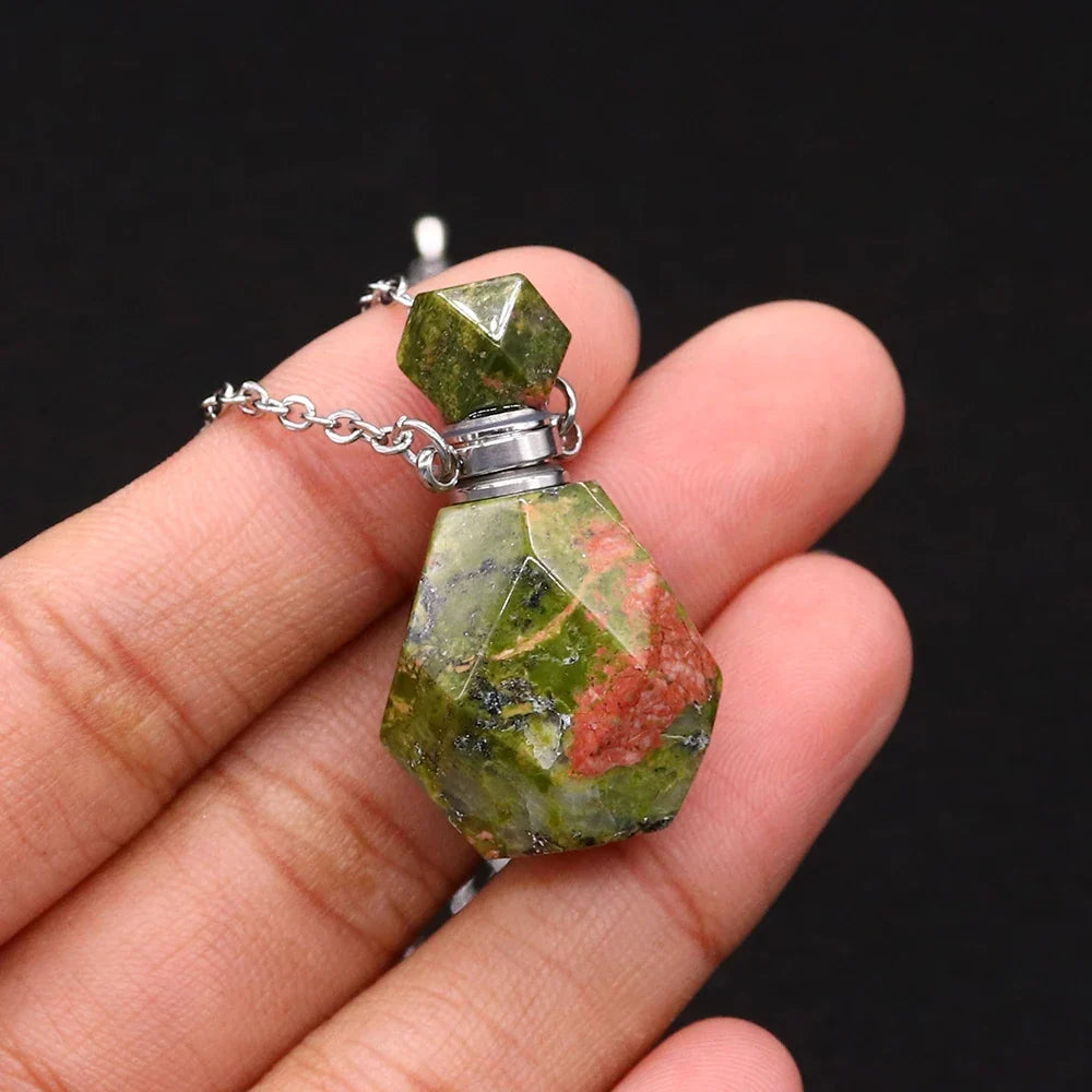 Small glass potion bottle pendant filled with crystals on a stainless steel chain — view 12 of 12
