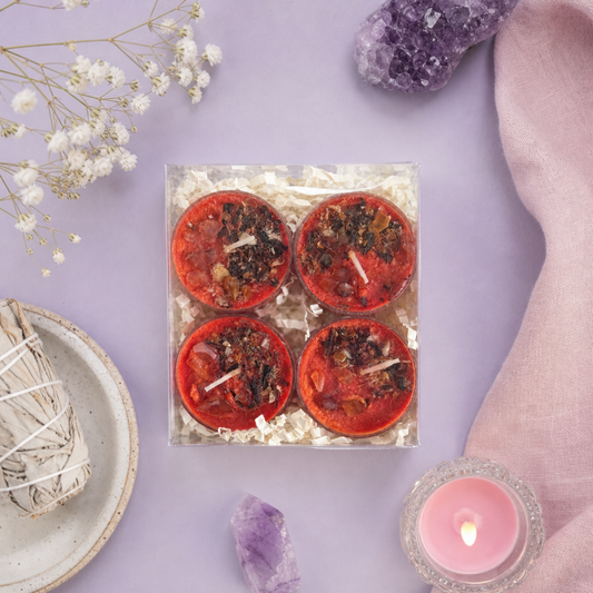 The Shakti devotional tealight set with a row of small dressed ritual tealights.