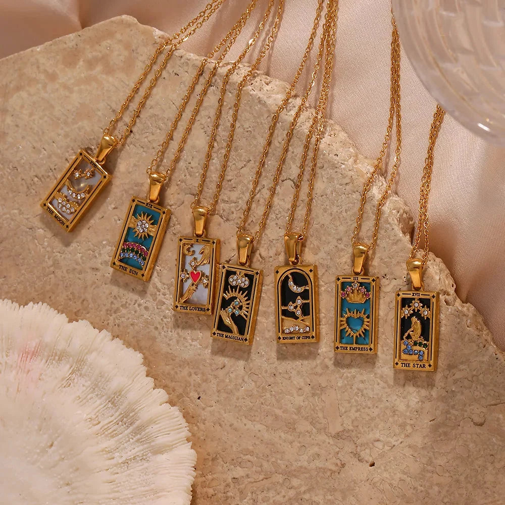 Gold-tone stainless steel tarot card pendant necklace with enamel and zircon detail on a fine chain — product photo 2