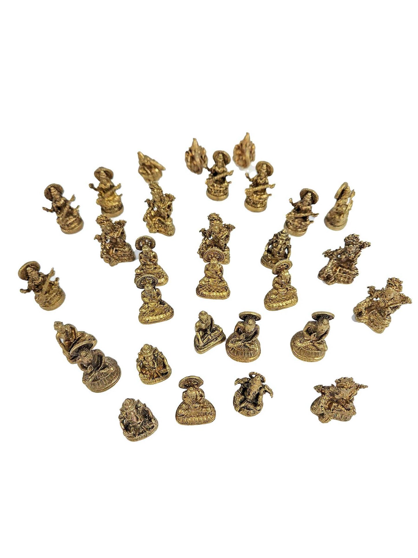Small brass statue figurine sized to fit in the palm of a hand, close-up detail