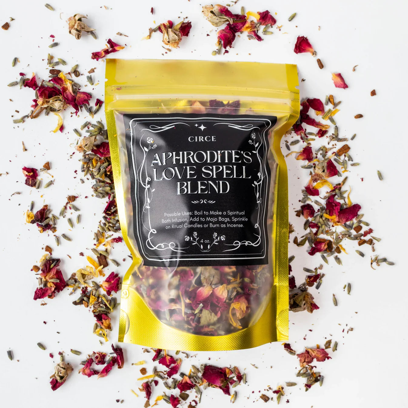 Aphrodite's love spell kit with a herbal blend jar and a half ounce attraction oil bottle, shown from another angle