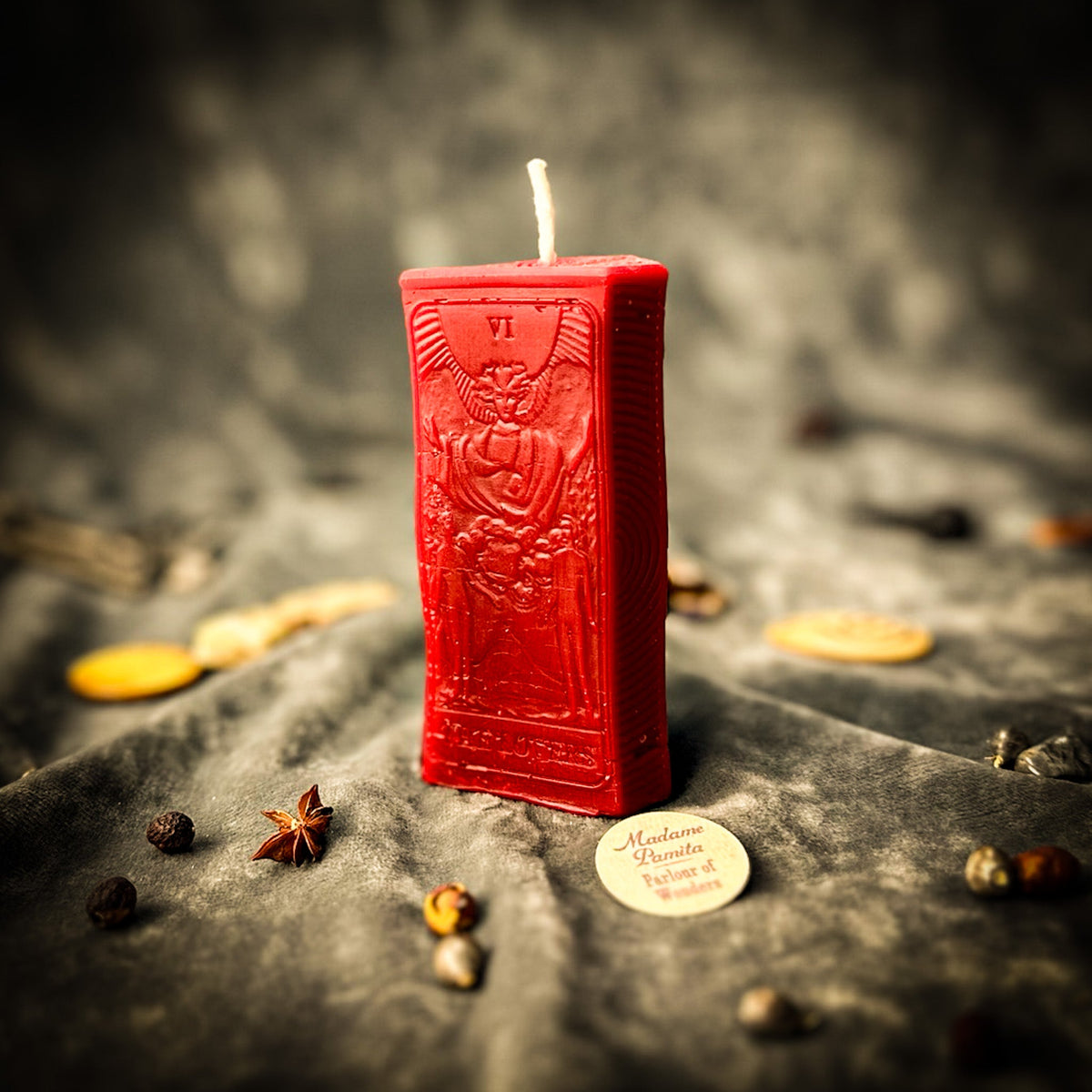 Red beeswax The Lovers tarot card candle with the numeral VI at the top