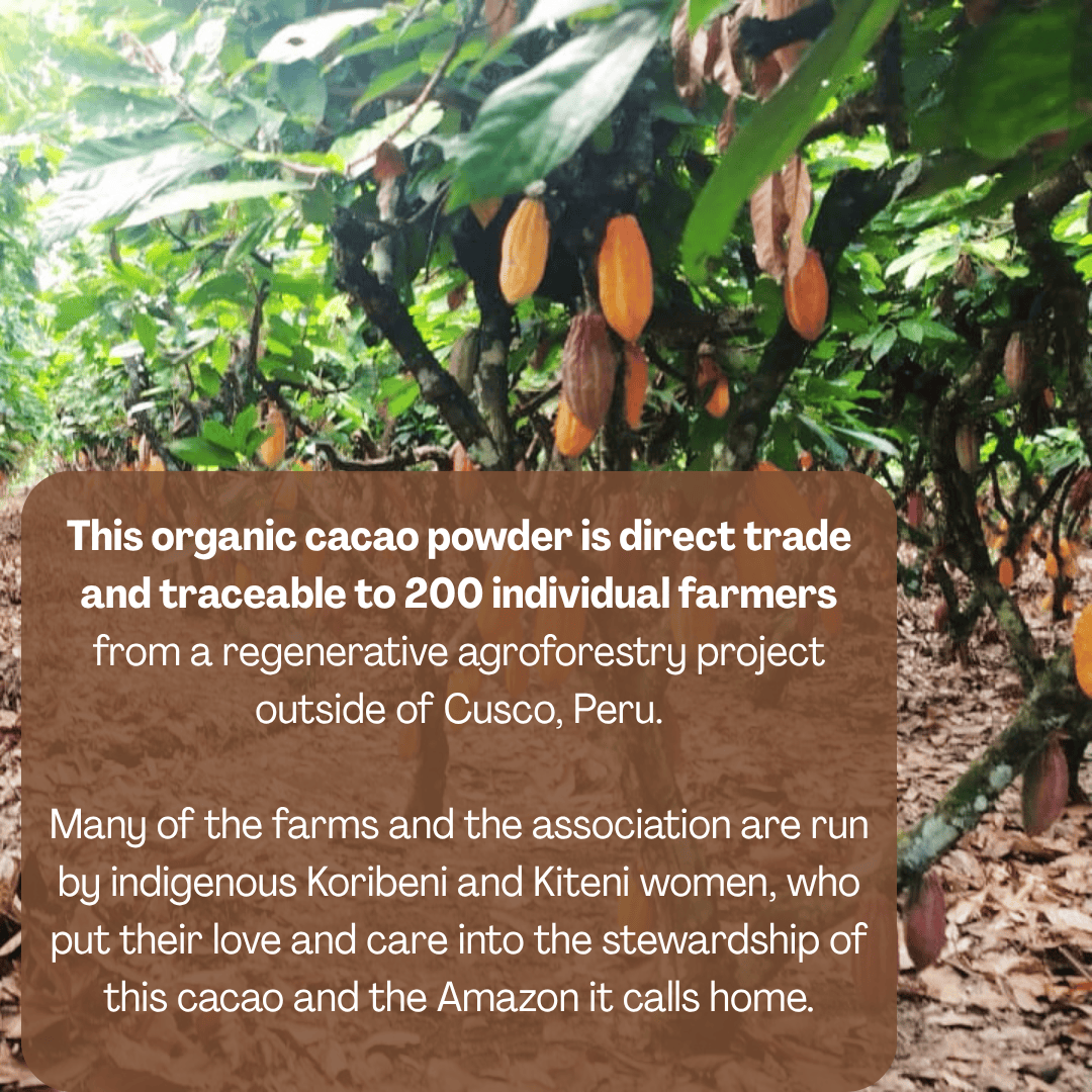 Ora Cacao Triple Fat cacao powder tin shown in a warm, styled tabletop arrangement.