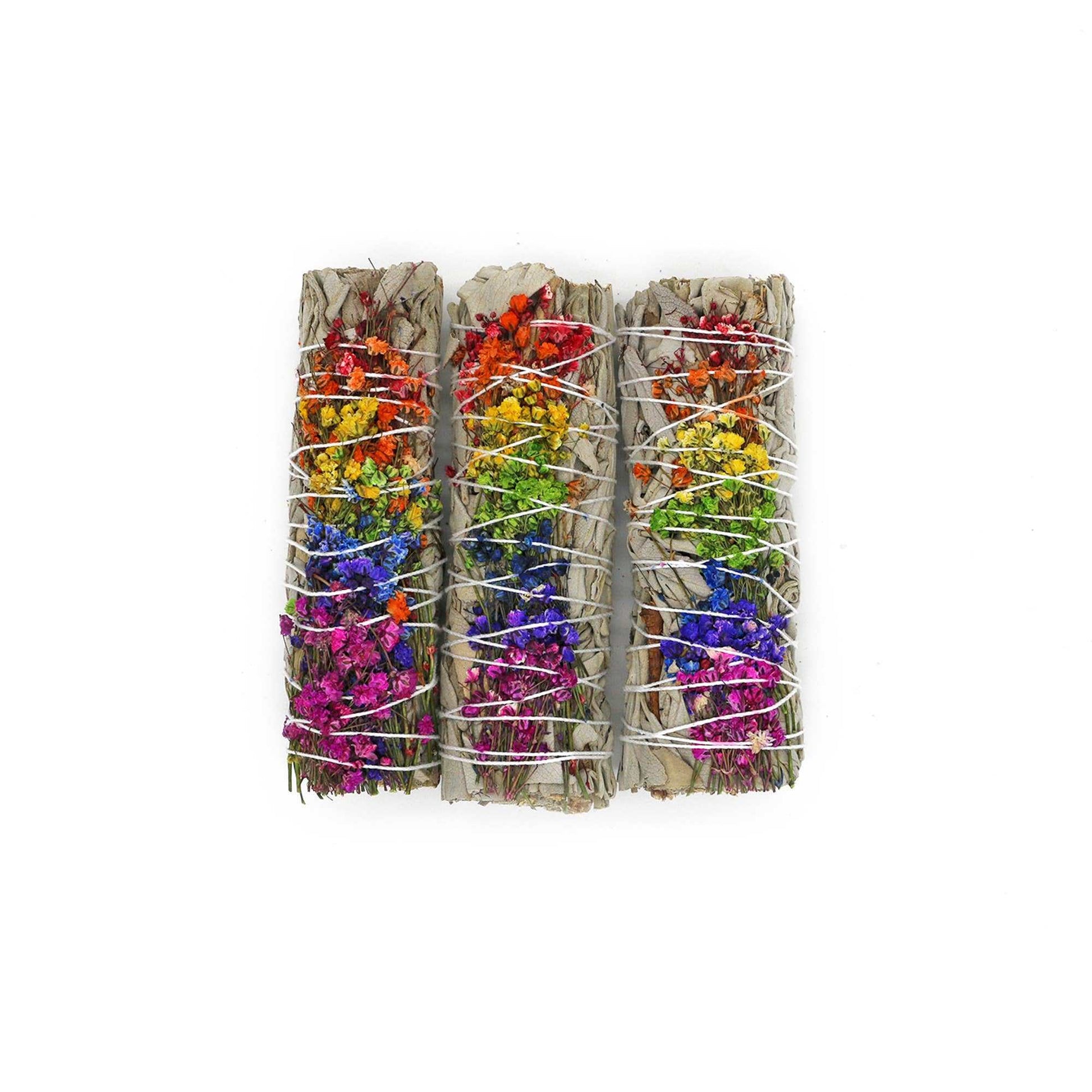 The 'Energy Wheel' floral sage smudge stick on a plain background