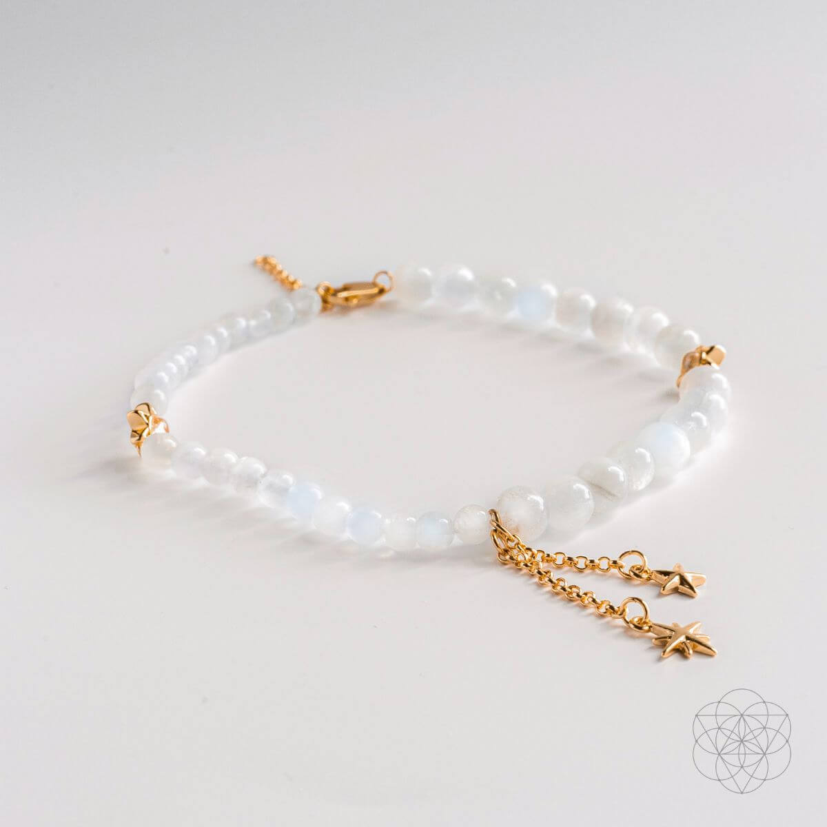 Matching moonstone anklet and earrings set with pearly white stones — view 6 of 7