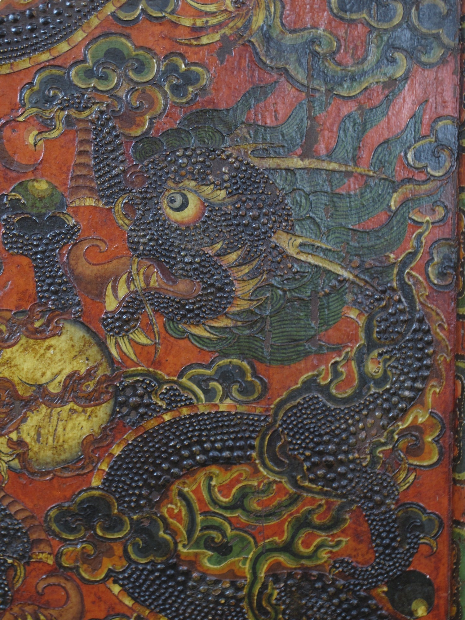 Antique Tibetan pine wall panel hand-embossed with flying dragons, clouds and ocean waves — view 9 of 19