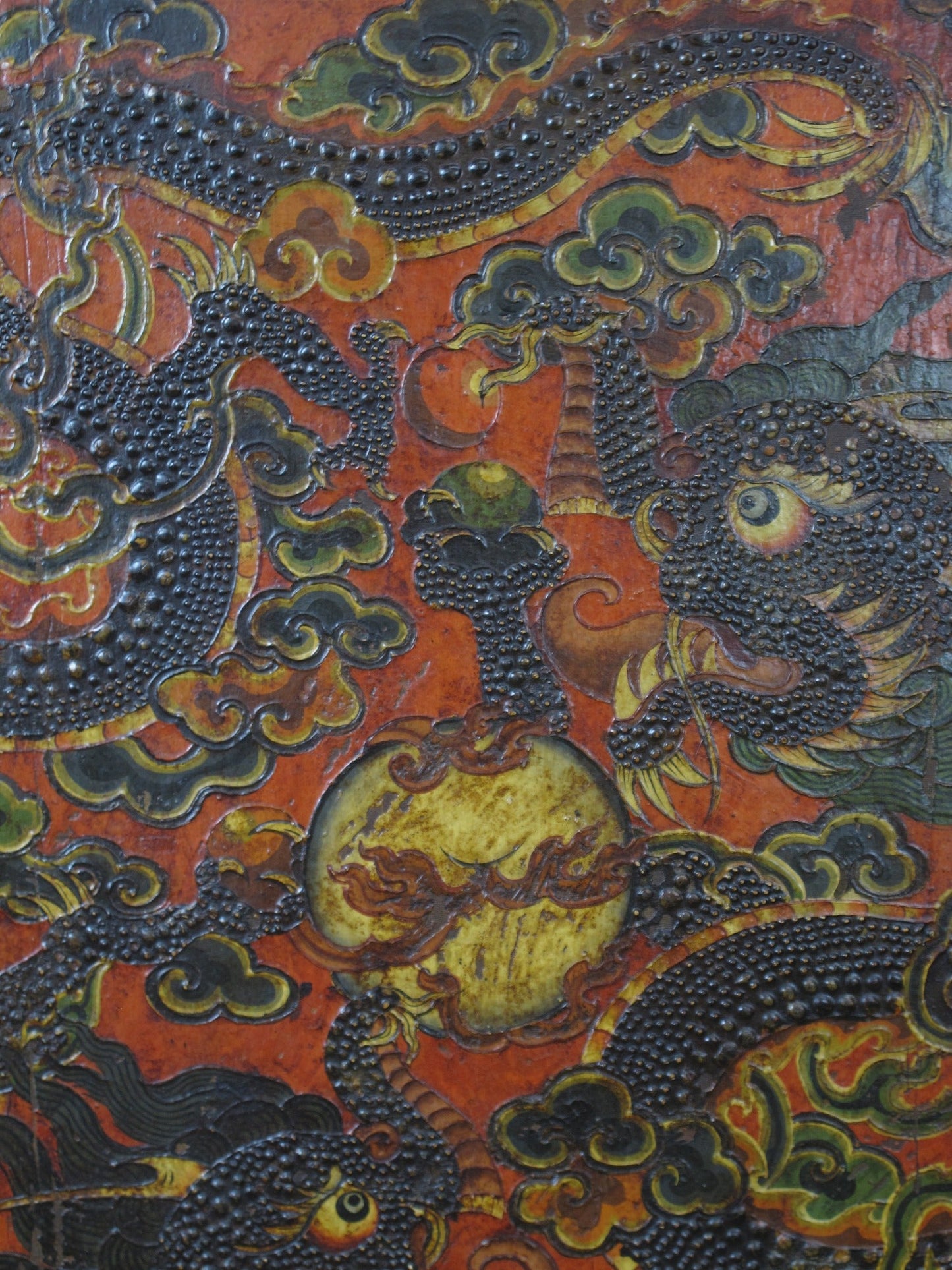 Antique Tibetan pine wall panel hand-embossed with flying dragons, clouds and ocean waves — view 11 of 19