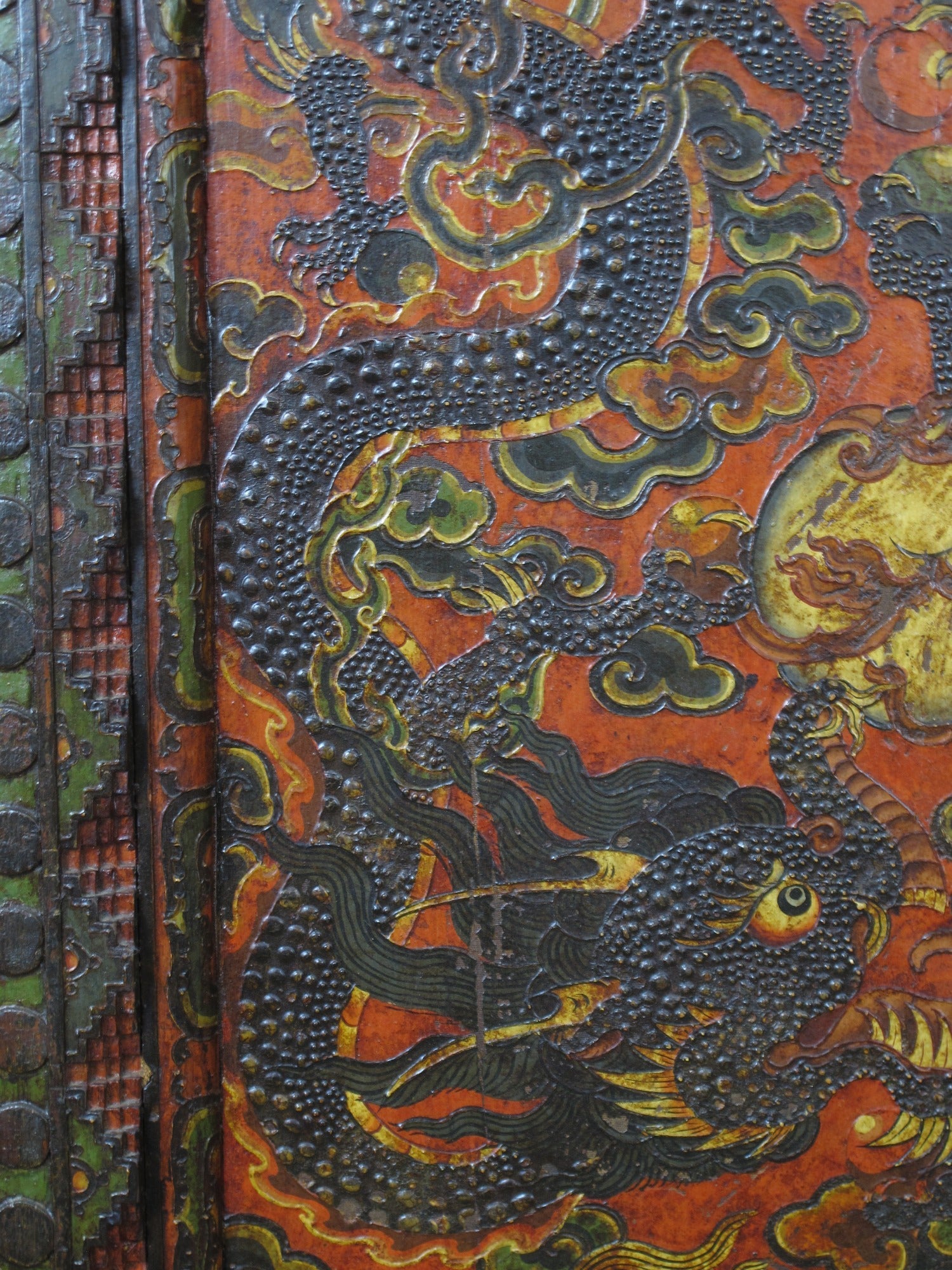 Antique Tibetan pine wall panel hand-embossed with flying dragons, clouds and ocean waves — view 8 of 19