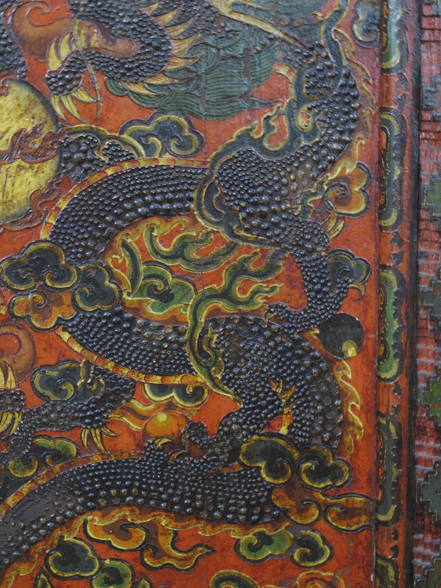 Antique Tibetan pine wall panel hand-embossed with flying dragons, clouds and ocean waves — view 10 of 19