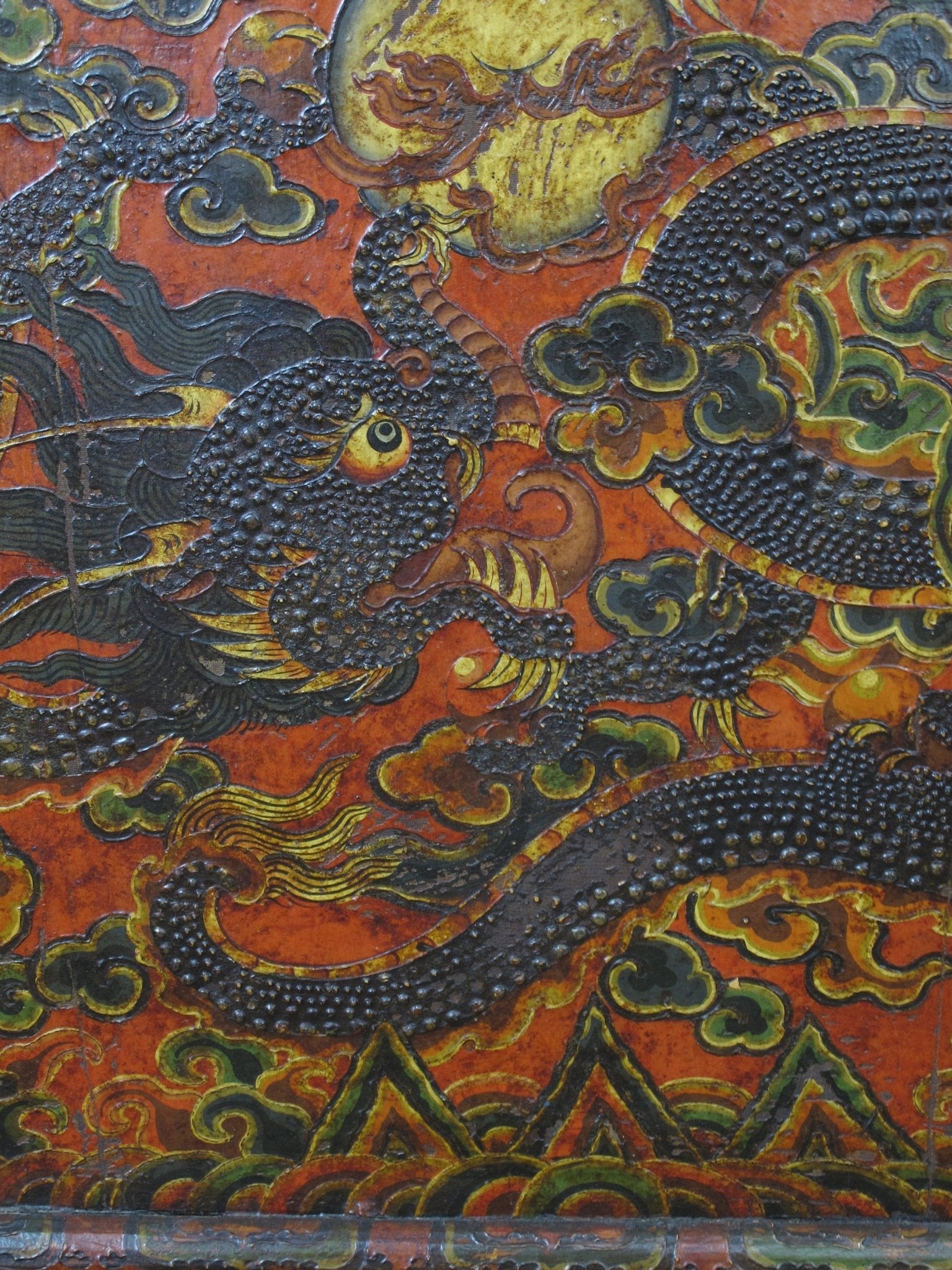 Antique Tibetan pine wall panel hand-embossed with flying dragons, clouds and ocean waves — view 12 of 19